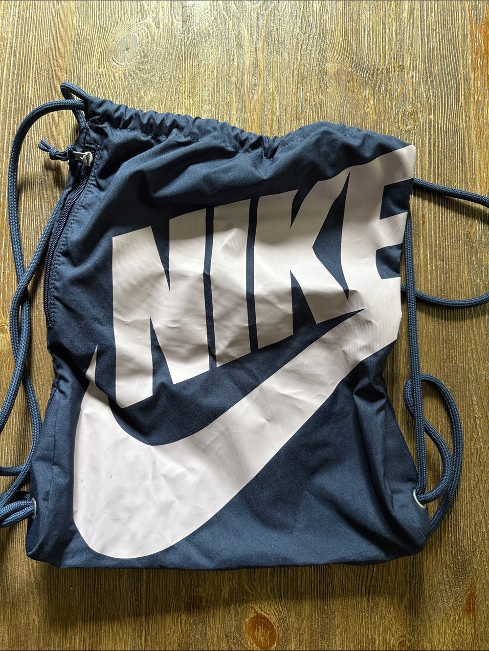 Nike Navy Drawstring Backpack with White Swoosh Logo